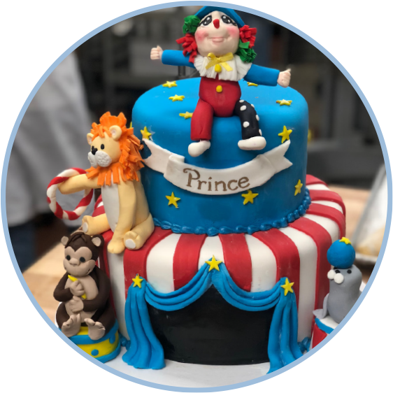 Photo: fondant cake with circus theme and characters
